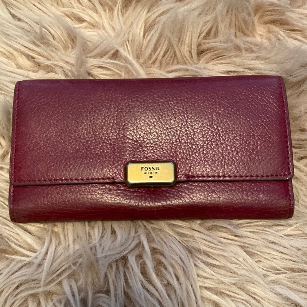 Burgundy leather wallet with snap closure